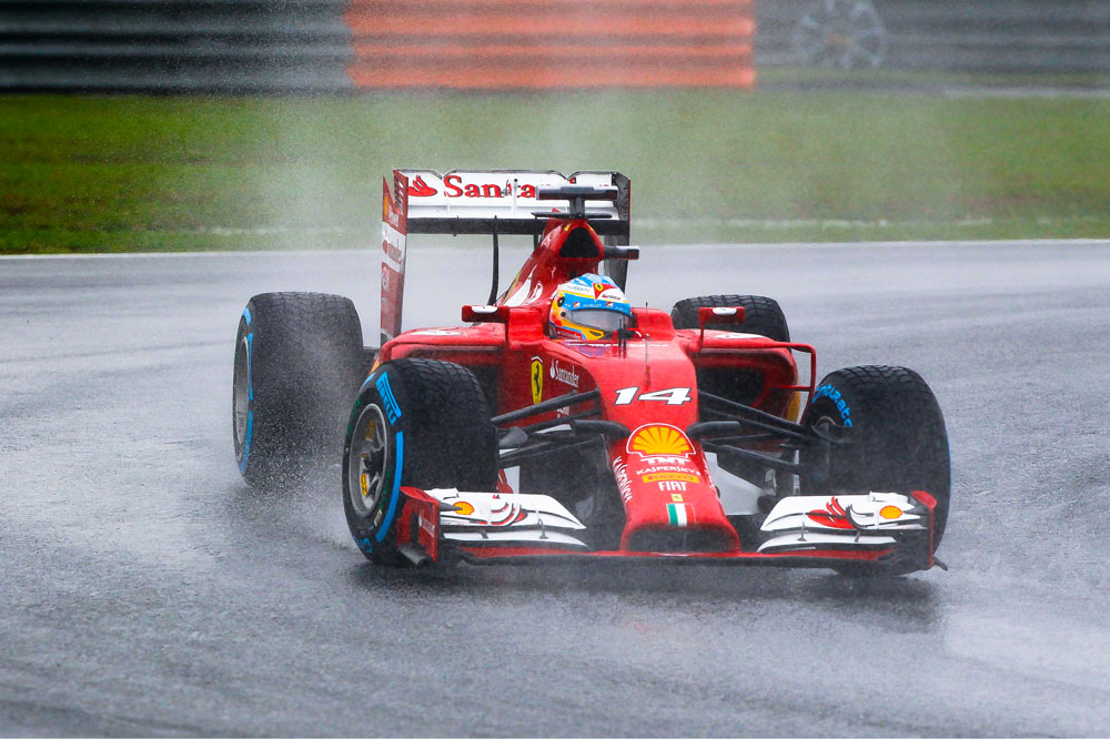 F1 driver in action in the Sepang rain